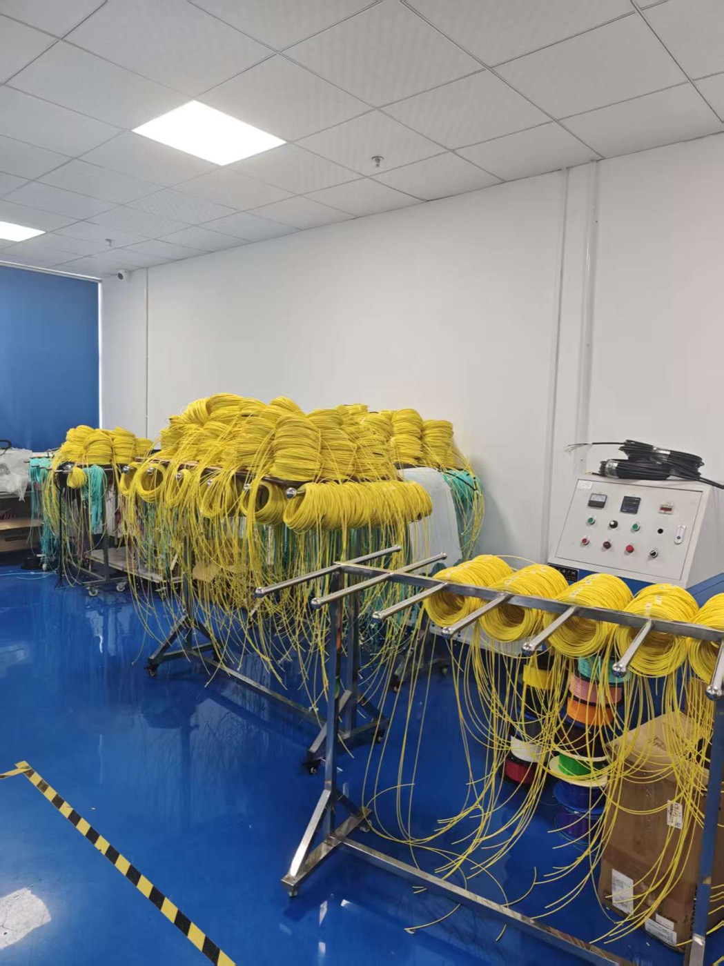 work in process racks for yellow and aqua fiber patch cords